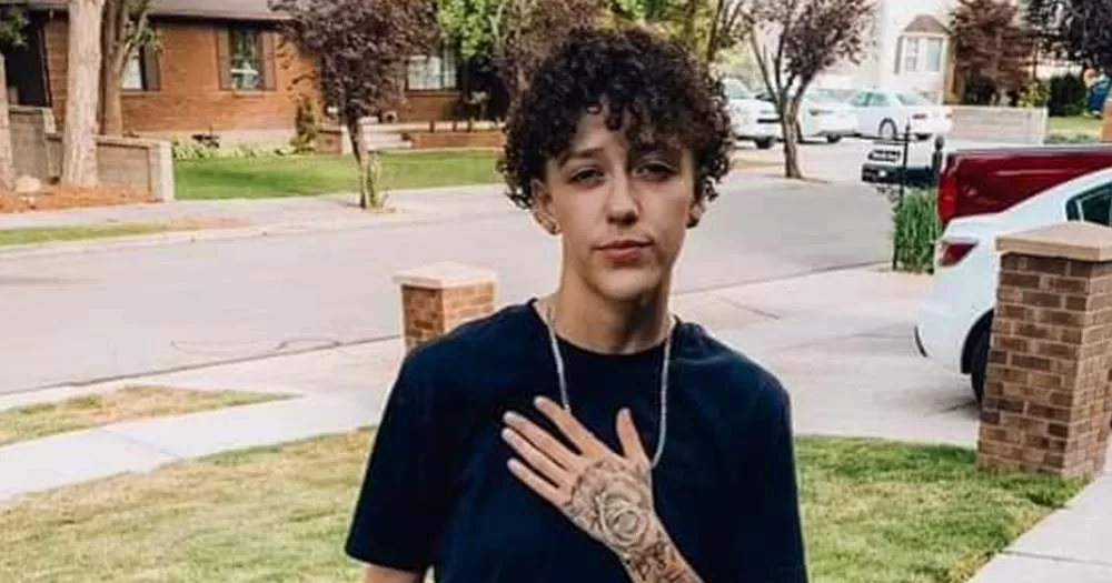 Photo of Alex Franco, wearing a black t-shirt with his hand over his heart. The transgender teen was abducted and murdered on March 17.