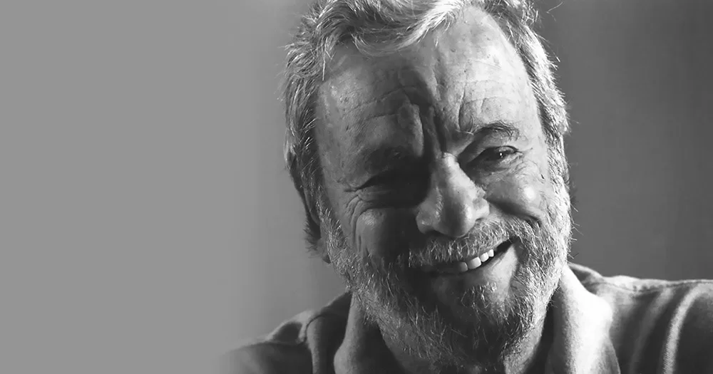 The picture shows Stephen Sondheim smiling.