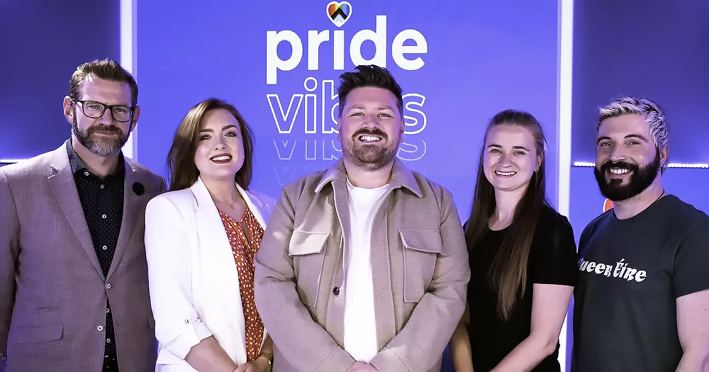 The picture shows the Pride Vibes team.