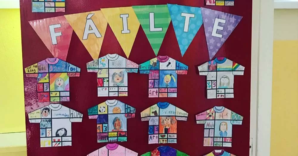Photo of Ireland primary school bulletin board reading "Fáilte" or welcome in rainbow colours, the new sex education curriculum is currently open for review.