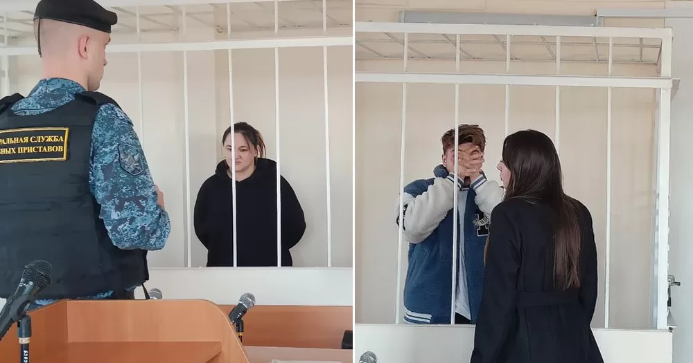 Two people arrested in Russia during a drag show, with police holding them behind bars.