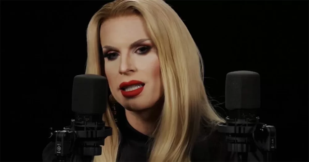 Drag queen Katya Zamolodchikova, who is checking into rehab, speaking into a microphone.
