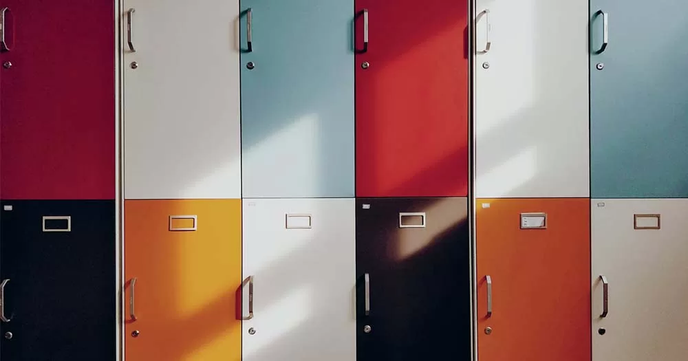 Photo of colourful school lockers, the article shows what it was like to be a LGBTQ+ student in Ireland in the 1970s and 1990s.