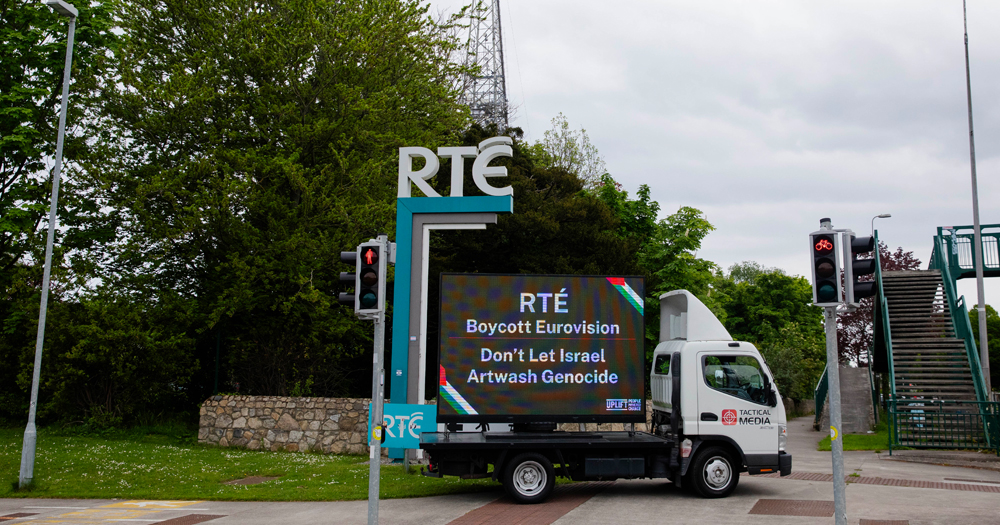 A protest held in Ireland calling for a Eurovision boycott, with a van parked in front of the RTE studios reading "RTÉ boycott Eurovision – Don’t Let Israel Artwash Genocide".