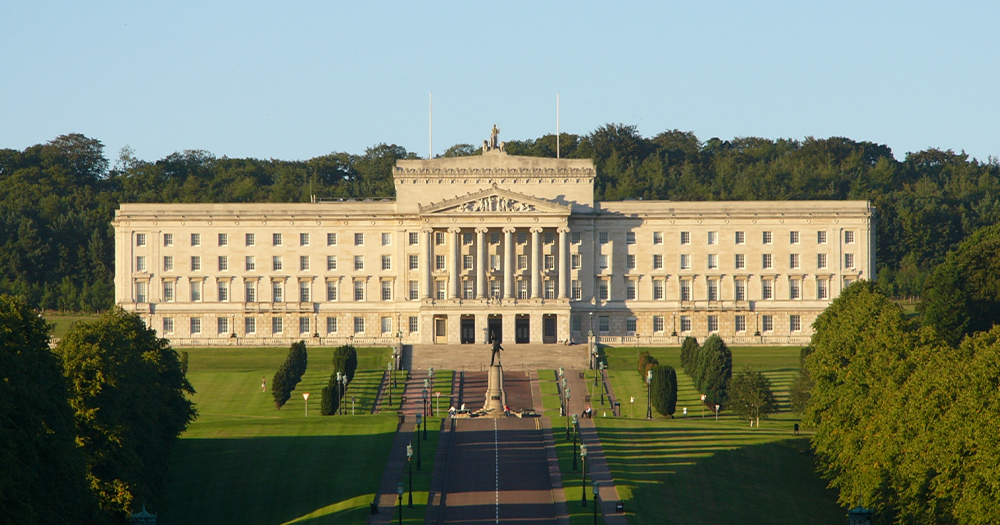 A front-facing photograph of Stormont Parliament in Belfast, Northern Ireland.