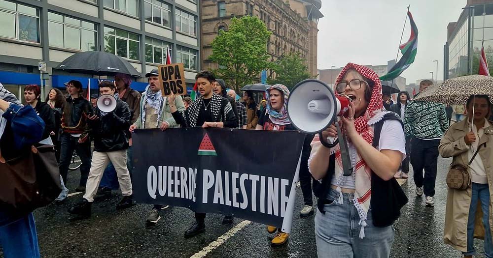 Group of protestors in Ireland marching with pro-Palestine banners and signs prior to Eurovision