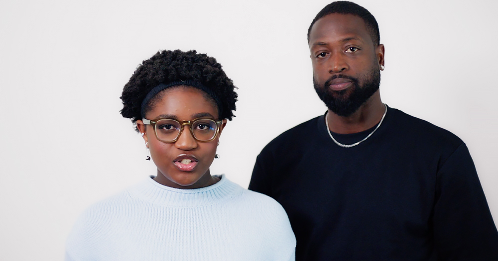 Photo of Dwayne Wade and his trans daughter in front of a white background.