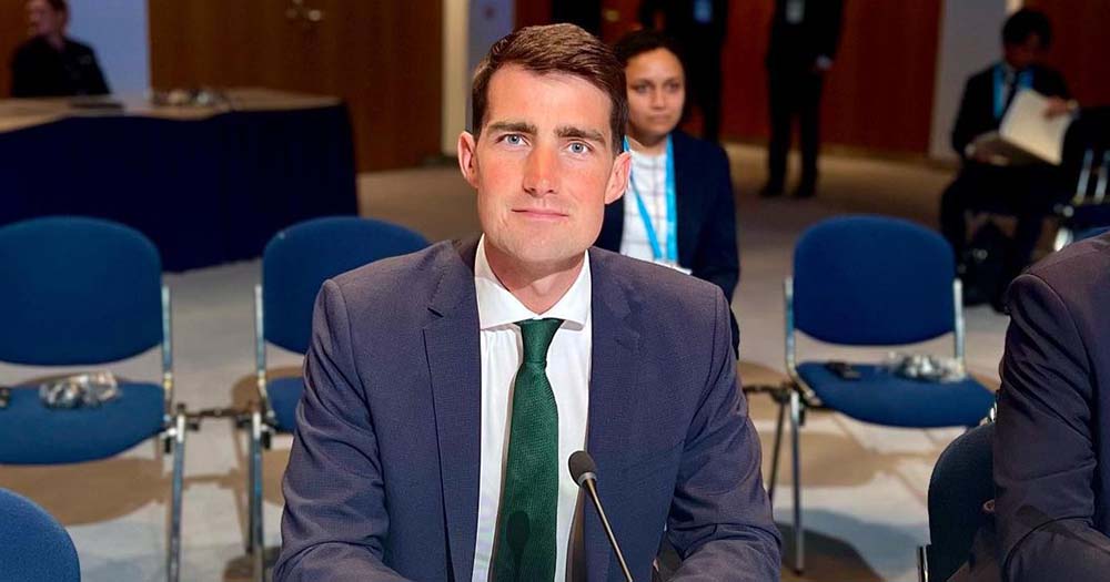 Photo of Jack Chambers wearing a suit and sitting in front of a microphone, Leo Varadkar predicted he may be the 