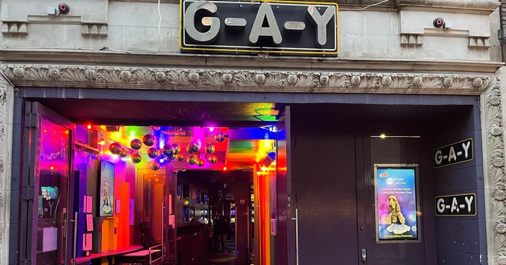 Entrance of G-A-Y Bar in London, which is now up for sale, with rainbow lightning inside.