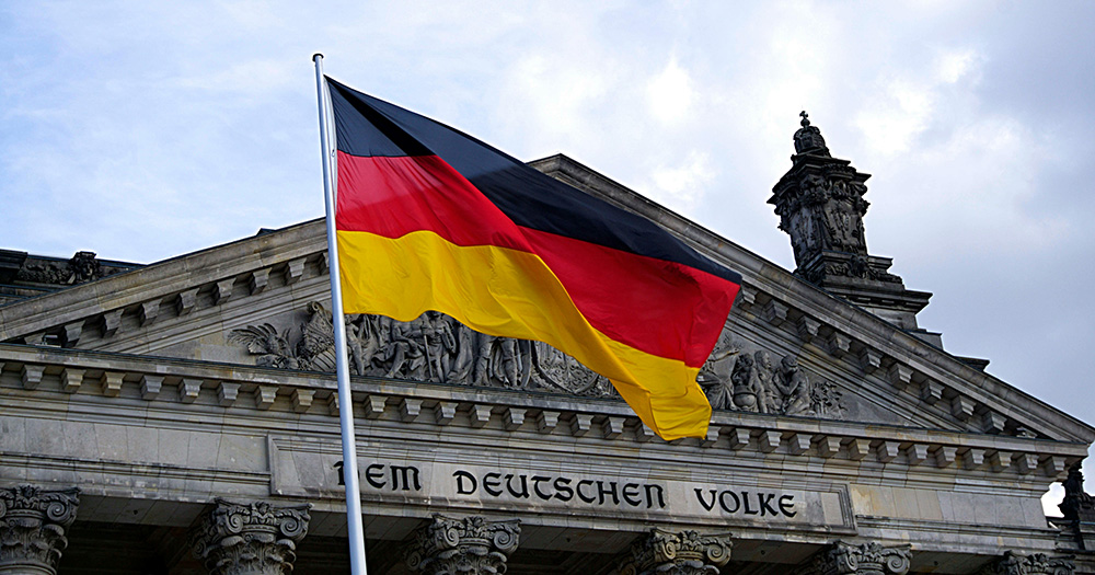 The flag of Germany outside the parliament building.