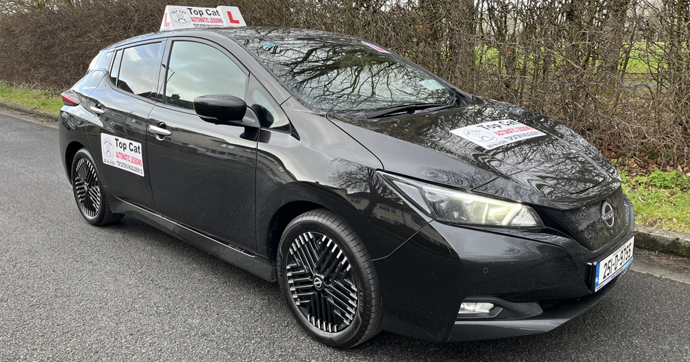 Car used by instructor at Top Cat Driving Academy. The car is a black Nissan Leaf.