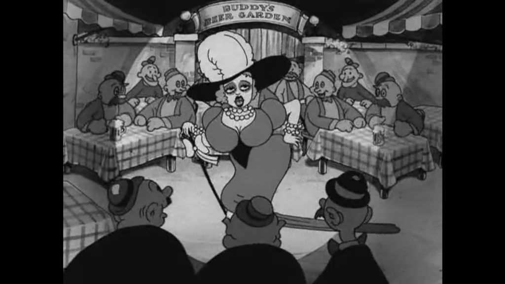 The Character Buddy is dressed up as a women as they are singing to a crowd of men. They are wearing a long dress, pearls, a big hat with a feather, and is holding a cane.