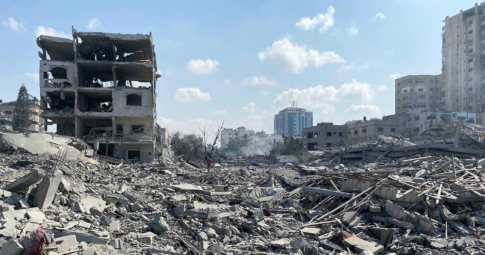 This article is about Israel breaking the Gaza ceasefire. In the photo, the rubbles of Gaza after buildings were destroyed by Israeli air strikes.