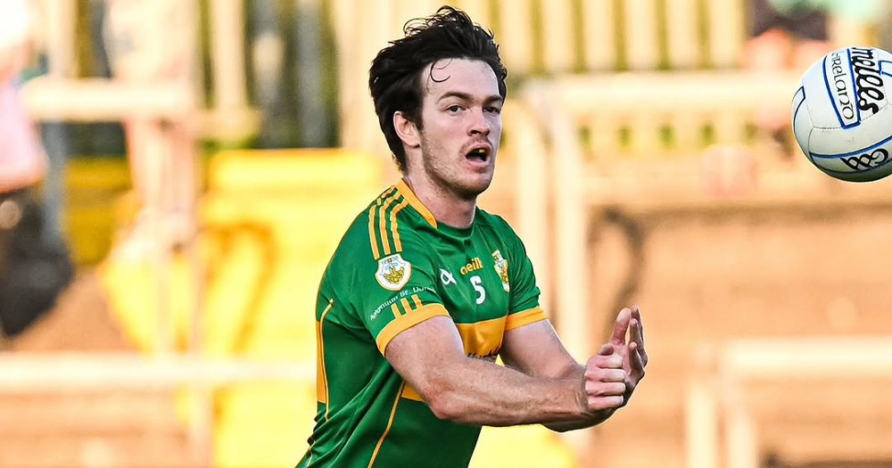 Kevin Penrose, a GAA player who shared his coming out journey, playing on the pitch.