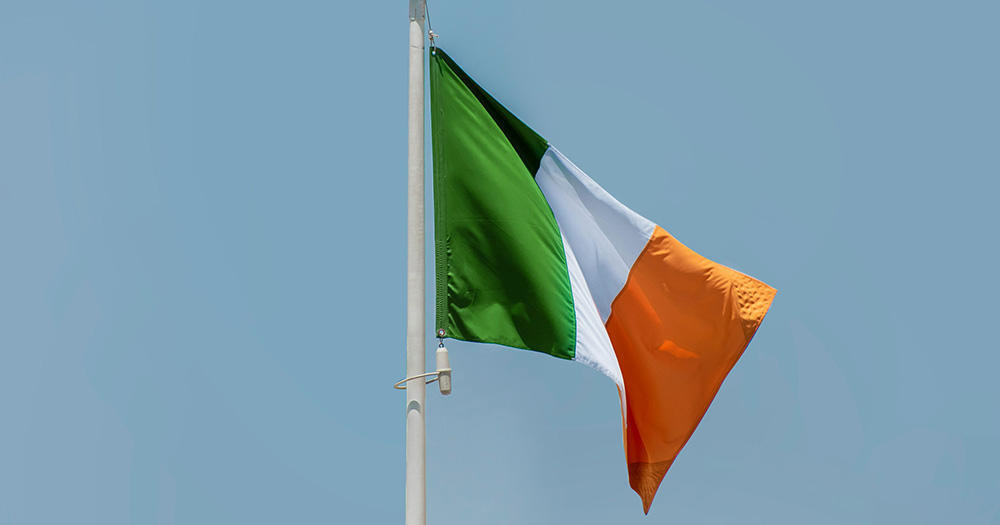 This article is about LGBTQ+ terms as Gaeilge. The image is of the Irish tricolour flag.