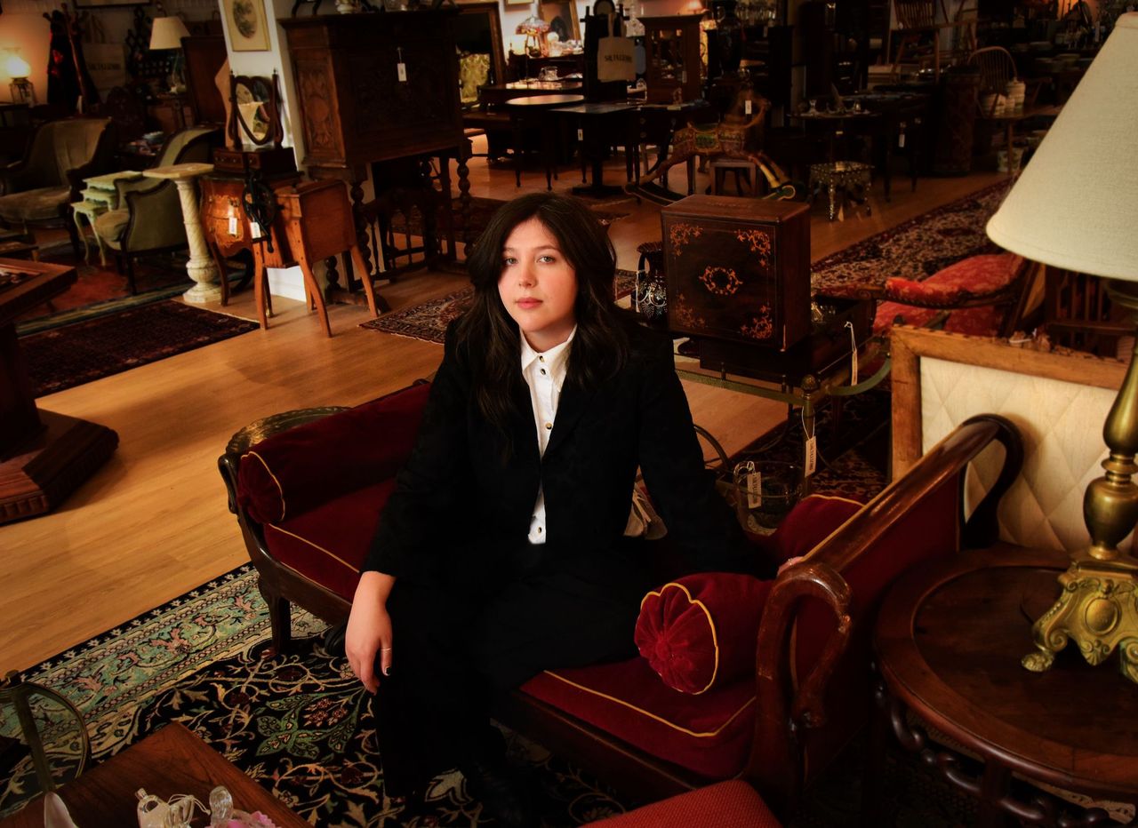 Photo of Lucy Dacus wearing suit