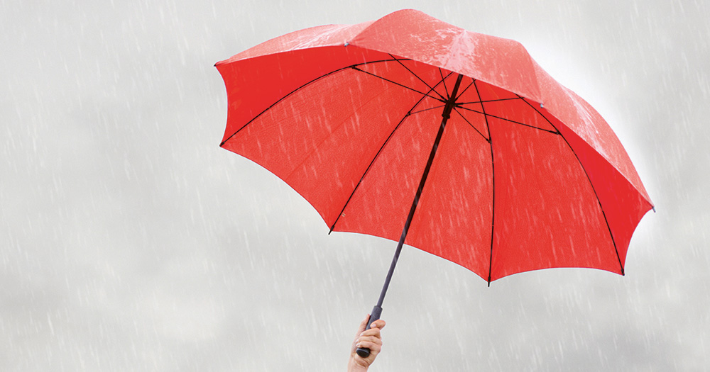 This article is about sex worker laws. The image is of a red umbrella in rainy weather.