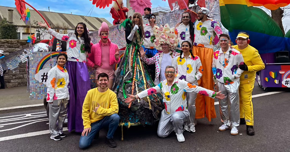 An image of The Outing collective posing for a photo at Dublin's St Patrick's Parade.