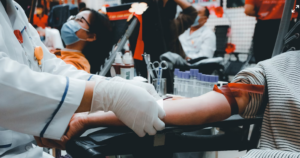 image shows a person donating blood - Greece has reinstated a long-standing MSM blood donation ban preventing gay and bisexual men from donating blood.