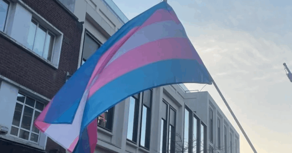 Image shows a Trans flag in dunlin. Sinn Féin has been officially banned from Trans and Intersex Pride Dublin. The decision follows a period of engagement between the Pride organisers and Sinn Féin party leaders.