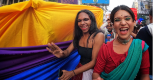 Image shows people celebrating a Pride parade in India, In a landmark judgement advancing the rights of trans individuals in India, the High Court of Andhra Pradesh has ruled that trans women are legally recognised as women