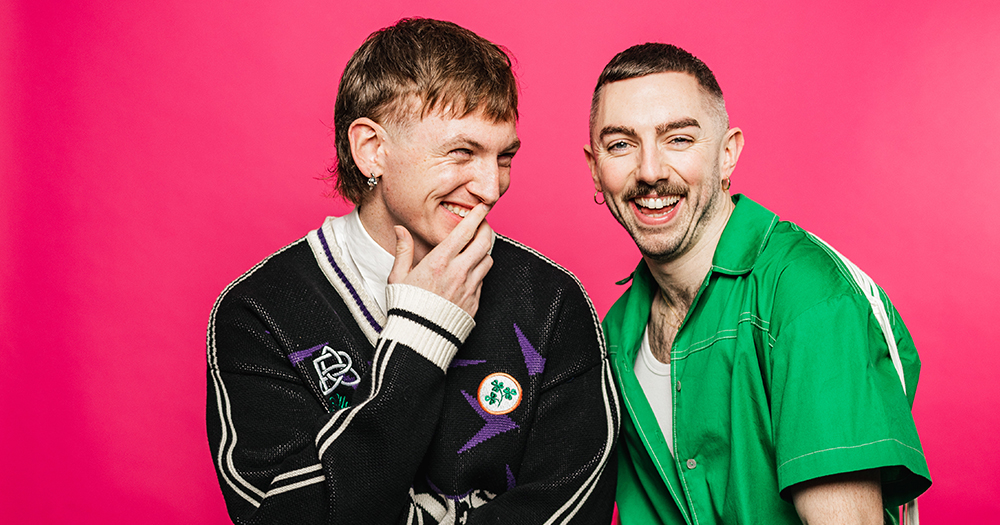 The GALAS have officially announced the hosts for the 2025 ceremony: none other than the I'm Grand Mam duo, Kevin Twomey and PJ Kirby. In the photo, the two of them laughing together in front of a bright pink background.