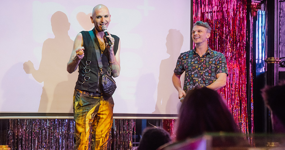 Veda Lady and Robbie Lawlor on stage at the Poz Vibe Tribe launch event.