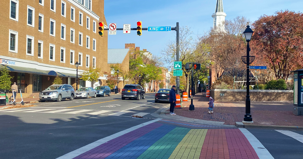 Photo of Washington DC ahead of World Pride, with a rainbow crossing and the city in the background.