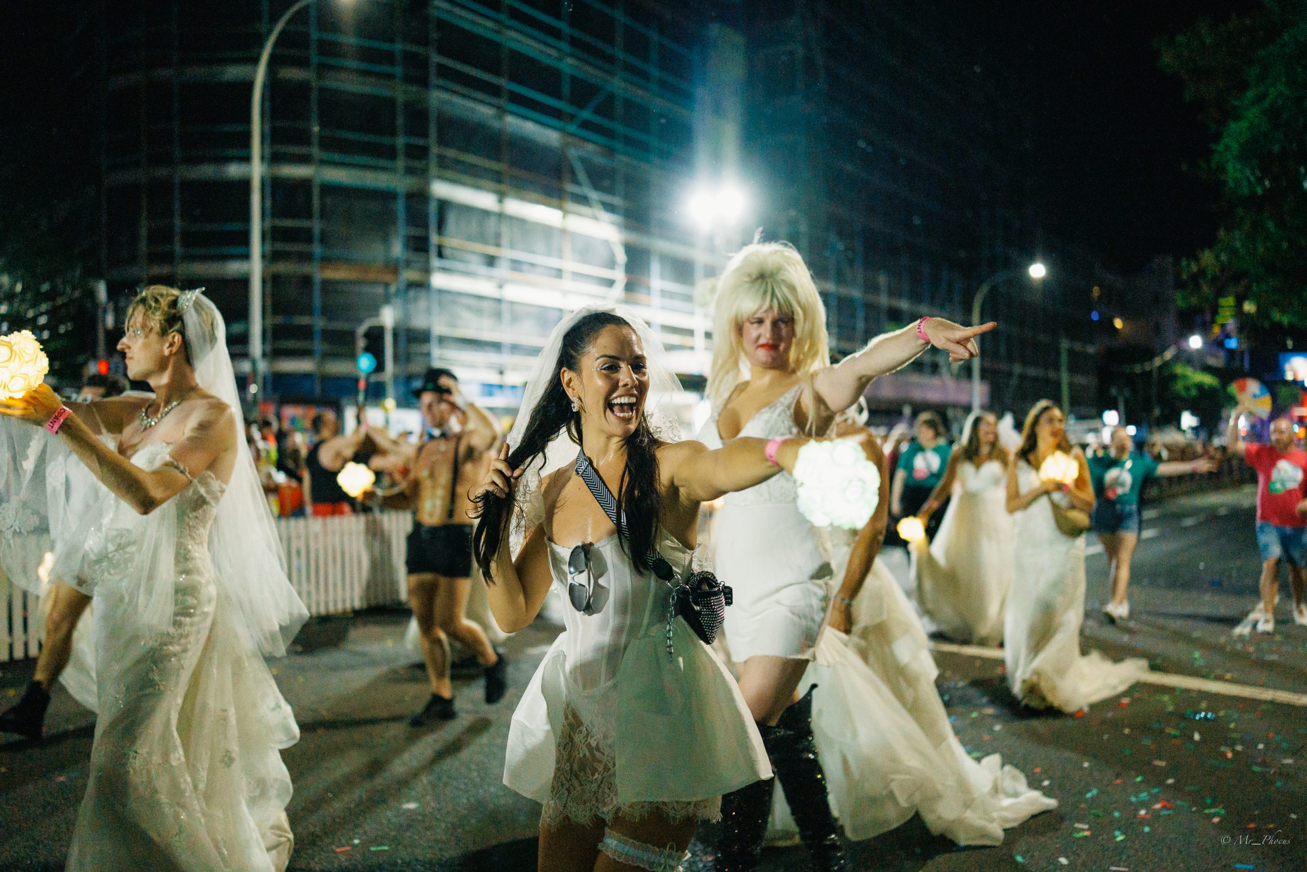 People taking part in a wedding parade in Sydney in celebration of Marriage Equality.