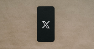 Image shows the X app on an Iphone, xAI's chatbot Grok has recently come under fire for extremist posts.