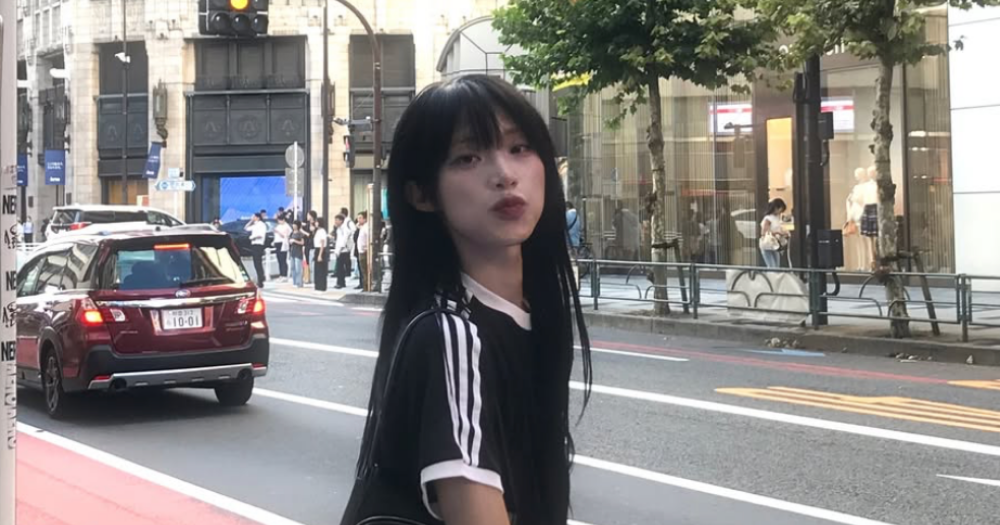 K-pop singer Cherry crosses a street in Tokyo.