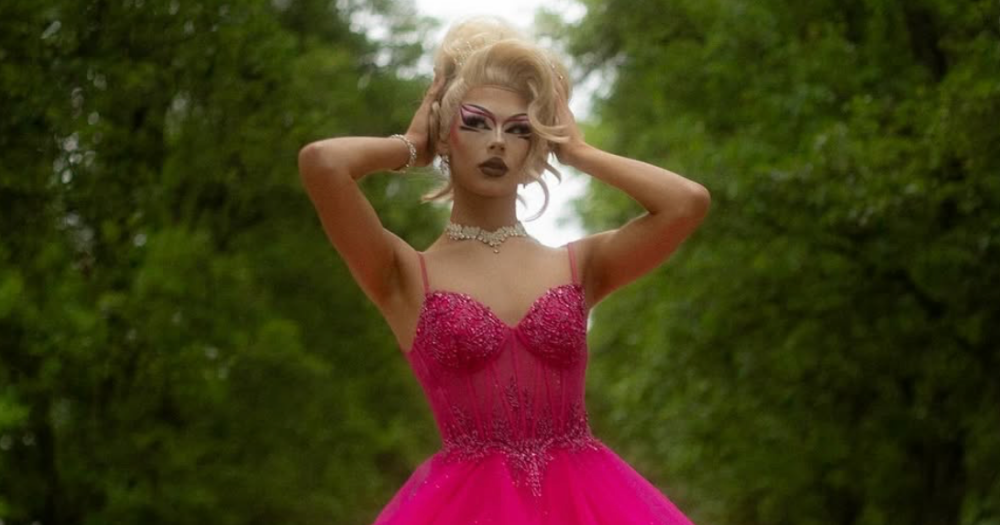 Image shows teen drag queen Alfie posing at prom