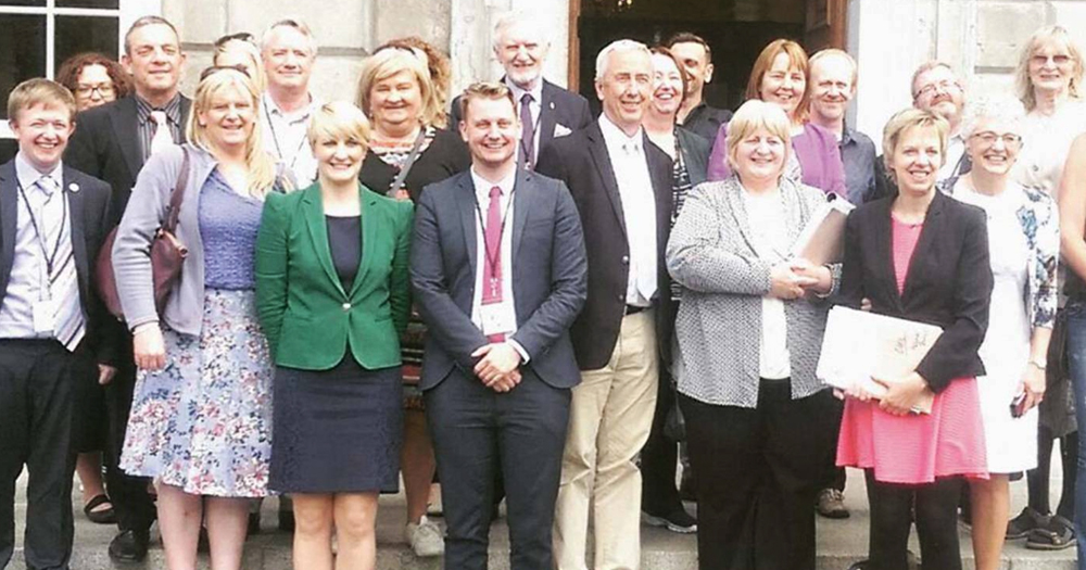 Photo taken after the Gender Recognition Bill entered its final legislative stage, with activists and politicians posing for a group photo.