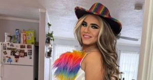 Hilary Rivers, a drag queen who was arrested by ICE, posing for the camera.