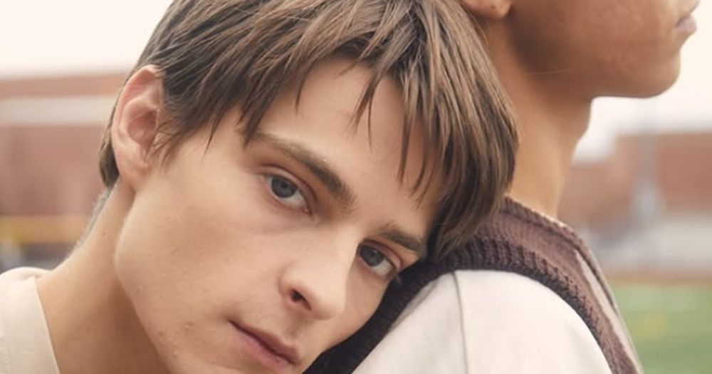 Corey Fogelmanis and Miles Gutierrez-Riley posed outside for the I Wish You All the Best movie. Fogelmanis looks at the camera with Gutierrez-Riley in a profile view.