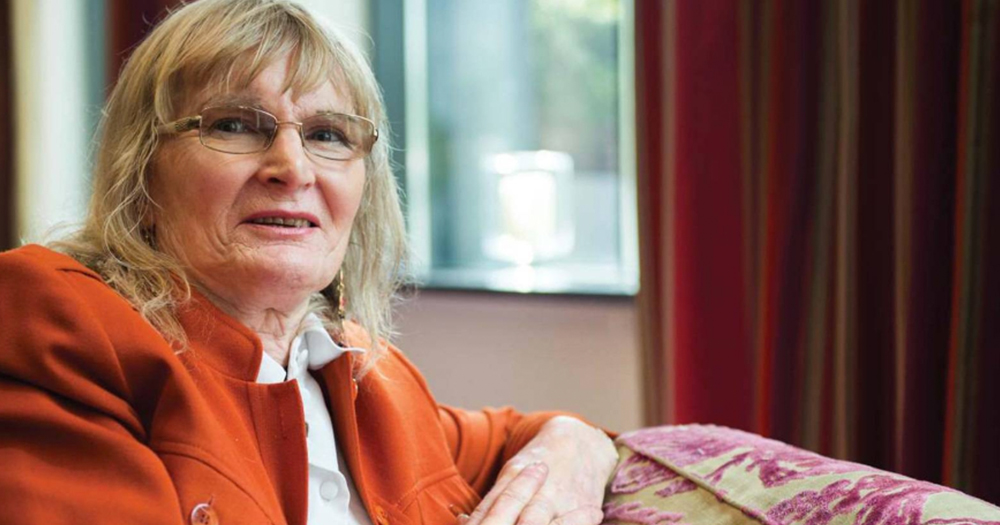 Dr Lydia Foy posing for the camera and smiling.