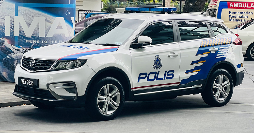 A police car in Malaysia, where 20 arrests were made at a gay party.