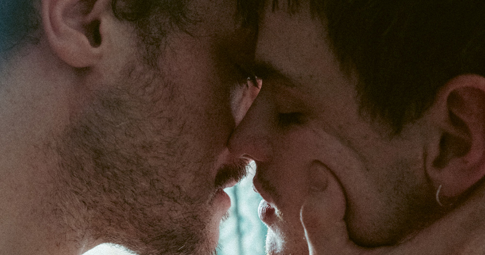 A still of two men kissing from the Northern Irish Iris Prize nominated film Purebred.