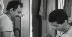 A black and white still from queer Indian film Badnam Basti.