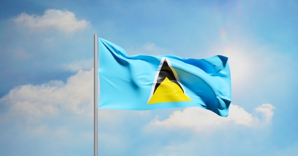 This article is about a ruling decriminalising same-sex intimacy in St Lucia. In the image, the flag of Saint Lucia flying on a blue sky.