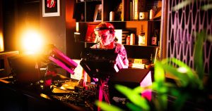 A DJ at Peach in Hen's Teeth.