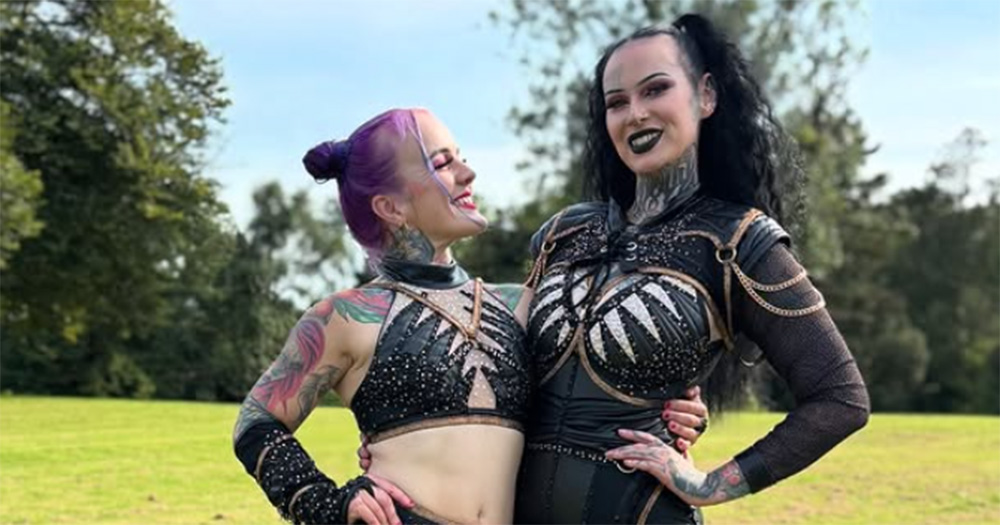 Devour The Night organisers Kitty and Megan smile for a photo with their arms around each other.