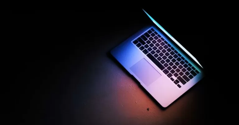 This article is about the Cyberfeminism archive. In the photo, a laptop in the dark lighting up its keyboard.