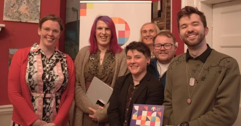 The image features James Curry of TENI and panel members at the launch of their Transgender & Intersex Sports Inclusion Policy Guide