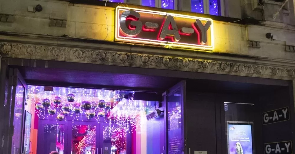 Front door of London's venue G-A-Y Bar, which is set to close soon, with purple lights coming from the inside.