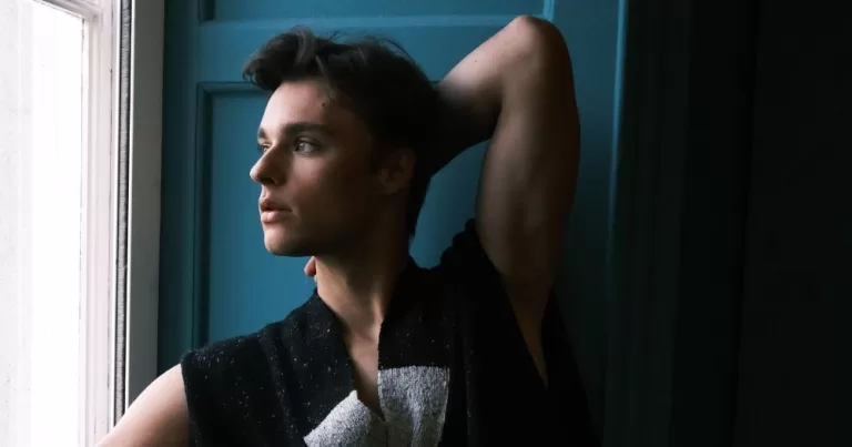 A model for Mar Knitwear's new collection with Donegal Yarns wears a sparkly black woollen vest.