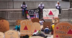 Activists from ACT UP London staging a die-in in Trafalgar Square.