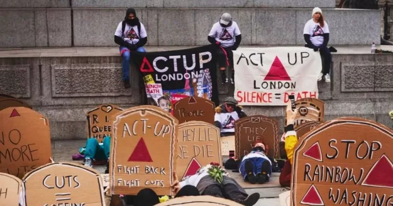 Activists from ACT UP London staging a die-in in Trafalgar Square.