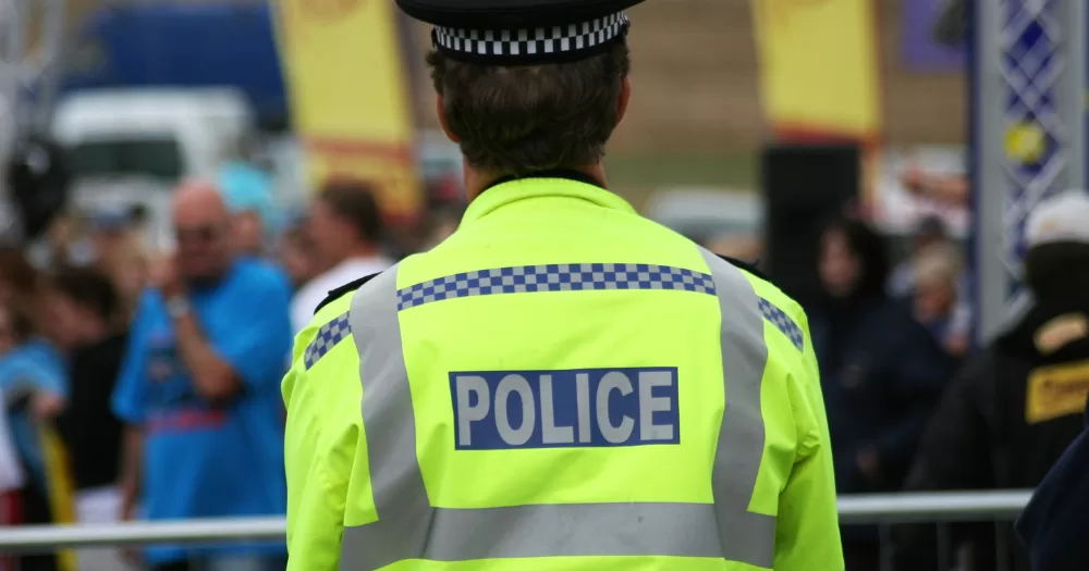 A member of the PSNI. The PSNI has confirmed arrest of 100 suspects after riots in Ballymena