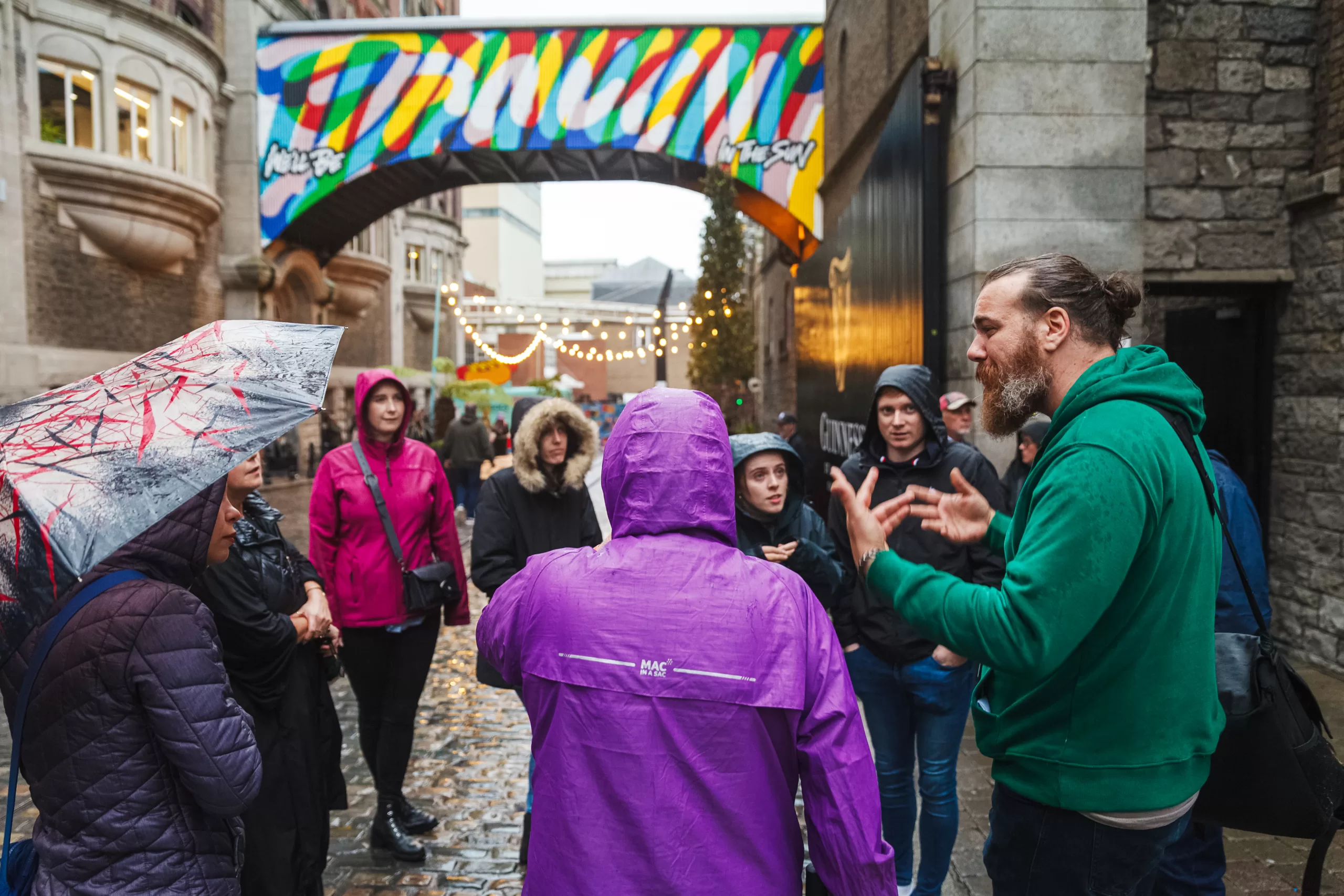 A walking tour gathers in the Liberties.
